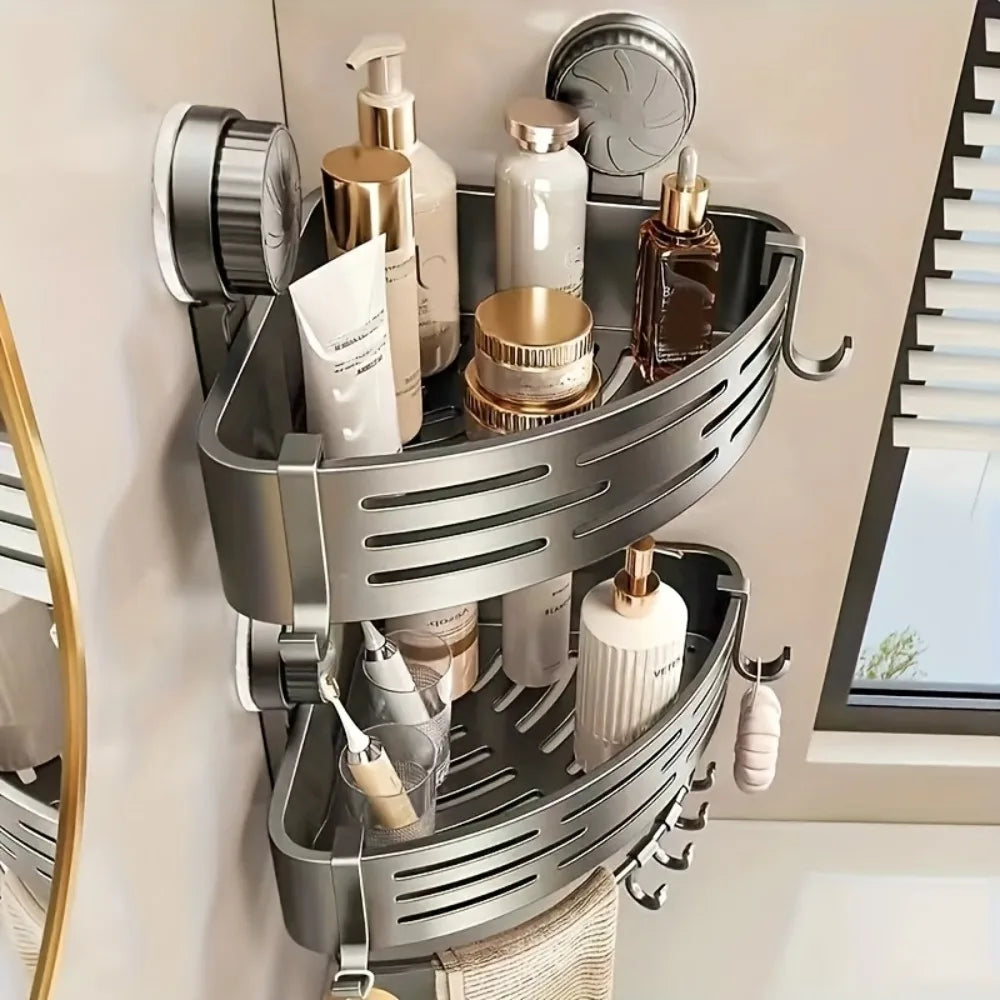 Two-tier Triangular Bathroom Storage Shelf mounted near a window, storing skincare and bath products. Sleek design with multifunctional hooks.